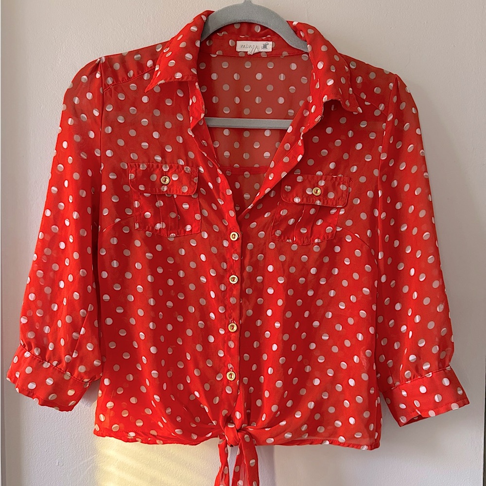 polka dot blouse.